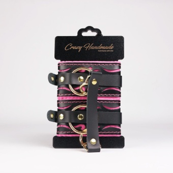 Черные кожаные оковы с розовой строчкой